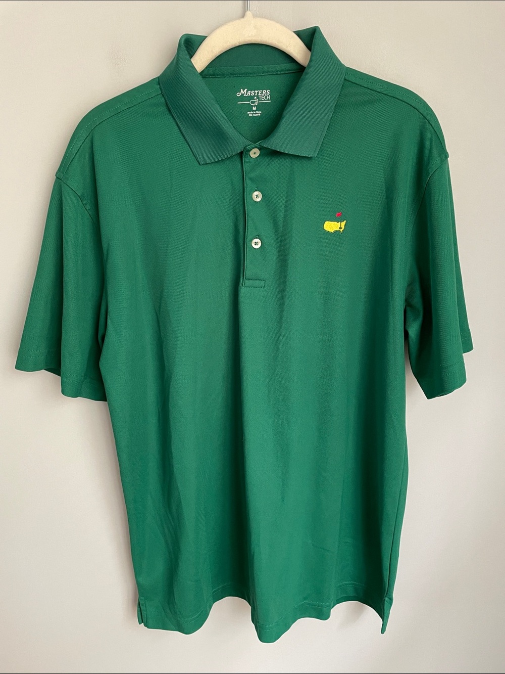 Masters Tech Green Golf Polo with Yellow Masters Logo Size Medium
